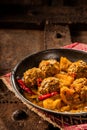 Traditional Tajine Dish of Yellow Curry Meatballs