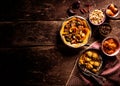 Traditional Tajine Dishes on Rustic Wooden Table