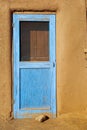 Traditional Taos blue door Royalty Free Stock Photo