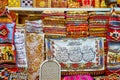 Traditional tapestries and rugs in a carpet stall of Al Souk al Kabir Old Market in Dubai, UAE Royalty Free Stock Photo