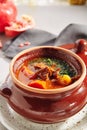 Traditional tasty hungarian goulash soup of beef meat and vegetables close up. Delicious meat stew or red casserole with tomato, p Royalty Free Stock Photo