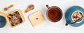 Traditional tea ceremony accessories, teapot and teacup with herbs and dry fruits tea. Destressing, relaxation, healing, healthy