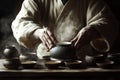 Traditional tea preparation with steaming pottery Royalty Free Stock Photo