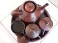 Traditional teapot set made of clay Royalty Free Stock Photo