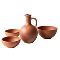 A rustic terracotta jug and three small earthenware bowls arranged together isolated on white background Royalty Free Stock Photo