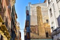 Traditional 19th century houses with painted mural on the facade of the new Tower in Plaza San Felipe, Saragossa, Spain