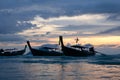 Traditional thai boats at sunset beach Royalty Free Stock Photo