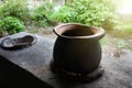 Traditional Thai clay pot on fire