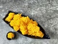 Antique Thai desserts crispy gold in black boat