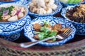 Traditional Thai food on bamboo tray or Khan Toke, local food in Northern of Thailand Royalty Free Stock Photo