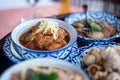 Traditional Thai food on bamboo tray or Khan Toke, local food in Northern of Thailand Royalty Free Stock Photo