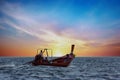 Traditional Thai long boat in Railay, Krabi, Thailand at sunset. Royalty Free Stock Photo