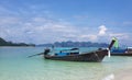 Thai long-tail boat on crystal clear green turquoise water of famous tropical white sand beach at Krabi, Andaman Sea, Thailand Royalty Free Stock Photo