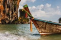 Traditional thai long tail boat at sunset in Railay beach, Krabi, Thailand. Royalty Free Stock Photo