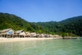 Traditional long-tail boats and houses of Morkan tribe Village or Sea Gypsies and tropical waters of Surin Islands, Andaman Sea,