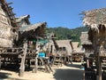 Traditional long-tail boats and houses of Morkan tribe Village or Sea Gypsies and tropical waters of Surin Islands, Andaman Sea,