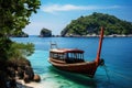 Traditional Thai longtail boat on the beach in Krabi, Thailand, Longtail boat anchored in the sea, with the landscape of the