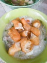 Traditional thai porridge rice gruel in white bowl congee. In th Royalty Free Stock Photo