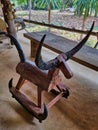 Traditional Thai rocking horse made of wood and buffalo horns