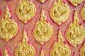 Traditional Thai Sculpture and pattern in wall of temple Royalty Free Stock Photo