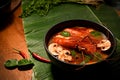 Traditional Thai spicy coconut soup with shrimps bowl. Tom Yum Kung