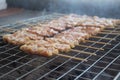 Traditional Thai steak roasted pork on grill Royalty Free Stock Photo