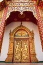 Traditional Thai style Buddhist church door Royalty Free Stock Photo