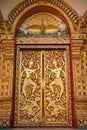 Traditional Thai style Buddhist church door Royalty Free Stock Photo