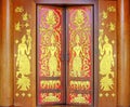 Traditional thai style carve on the wood door, temple of thailand Royalty Free Stock Photo