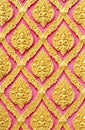 Traditional Thai style gold angels pattern on wall