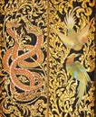 Traditional Thai style painting on temple doors