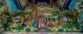 Traditional Thai style sculptures and painting in church under decoration of Wat Pariwat Temple Royalty Free Stock Photo