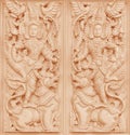 Traditional Thai style wood carving on the wall of Temple