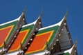 Buddhist temple`s roofs soar into blue sky Royalty Free Stock Photo