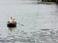 Traditional Thai way of selling food from small boat in the river