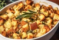 Traditional Thanksgiving bread onion and sage stuffing in baking dish. Classic holiday menu savory meal for celebration