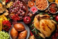 Traditional Thanksgiving day feast with delicious cooked turkey and other seasonal dishes served on table, top view Royalty Free Stock Photo