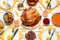 Traditional Thanksgiving day feast with delicious cooked turkey and other seasonal dishes served on white wooden table, flat lay Royalty Free Stock Photo