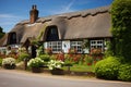 traditional thatched roof cottage in a rural setting Royalty Free Stock Photo