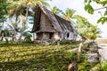 Traditional thatched yapese men`s meeting house faluw or fale. Yap island, Micronesia, Oceania. Royalty Free Stock Photo