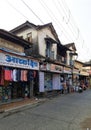 Traditional tiled roof house in market place in Alibag