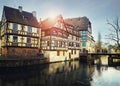 Traditional timbered houses near the river. Medieval home facade, historic town Strasbourg Royalty Free Stock Photo
