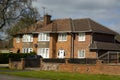 Traditional, tipycal english house. Brick stone house. street view. Spring time Royalty Free Stock Photo