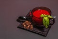 Traditional tomato soup in a cup. Basil, croutons, spices, cutlery Royalty Free Stock Photo