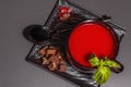 Traditional tomato soup in a cup. Basil, croutons, spices, cutlery Royalty Free Stock Photo