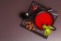 Traditional tomato soup in a cup. Basil, croutons, spices, cutlery Royalty Free Stock Photo