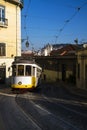 The traditional 28 Tram in the historic neighborhood of Chiado in Lisbon, Portugal Royalty Free Stock Photo