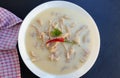 Traditional tripe soup on dark background