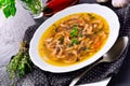 Traditional tripe soup in polish style with beef and vegetables