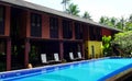 Traditional Tropical resort & swimming pool Royalty Free Stock Photo